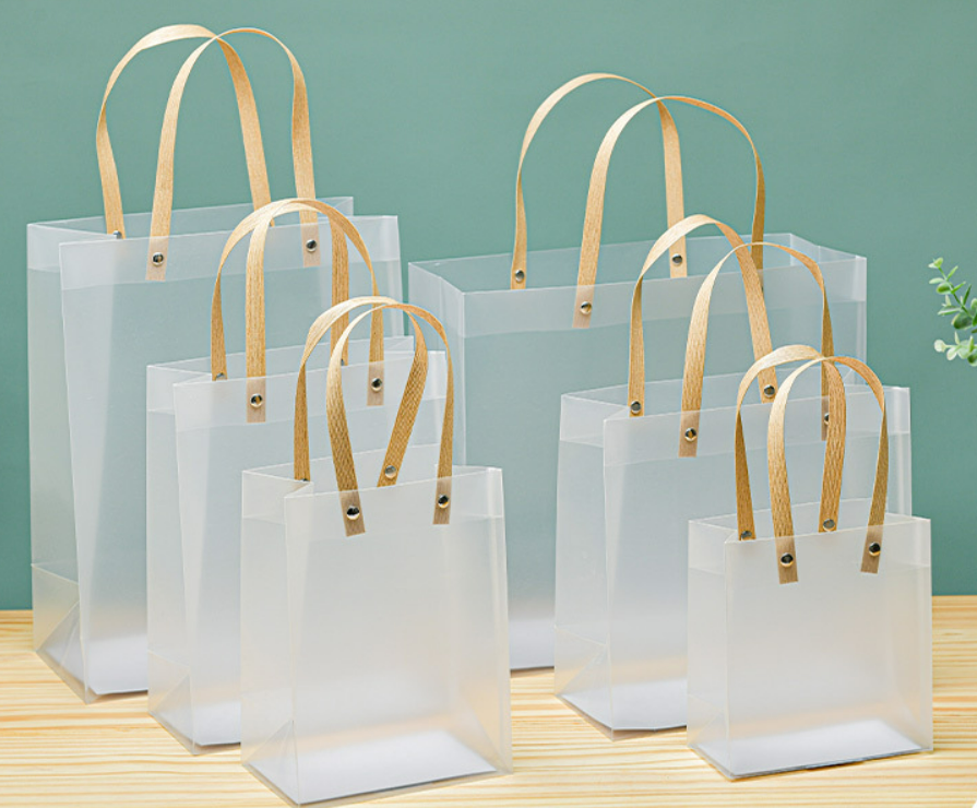 12pcs , transparent frosted PVC paper rope gift bag